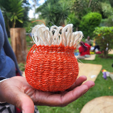 Small Kiondo basket made by a student of Okapu