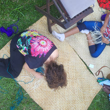 mother and daughter basket weaving in the Okapu Nairobi class