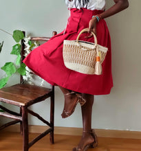 Neutral/ Nude top handle kiondo okapu with beaded round handles. Holiday or Vacation bag. Okapu is a social enterprise making kiondos great. African bags handmade in Kenya with love for gifts for women and to elevate their fashion style.