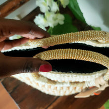 Neutral/ Nude top handle kiondo okapu with beaded round handles. Holiday or Vacation bag. Okapu is a social enterprise making kiondos great. African bags handmade in Kenya with love for gifts for women and to elevate their fashion style.